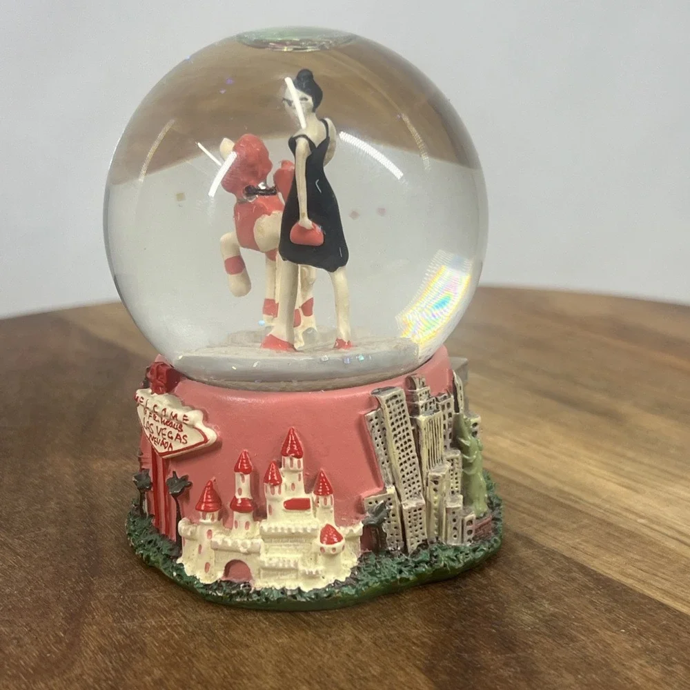 Las Vegas Glitter Snow Globe Landmarks 3.5 Inch.  Woman With Dog Figurine.‎
